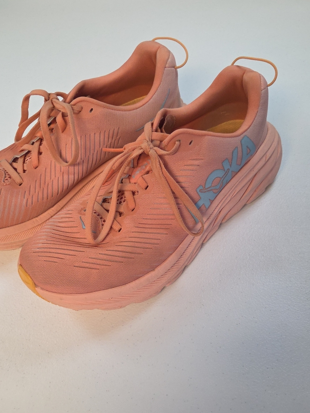 Hoka Women's Coral Peach Running Shoes with Light Blue Logo